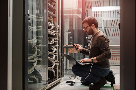 Man working on servers